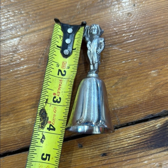 Reed & Barton Silver Bell with Toddler holding a sock - Picture 7 of 7